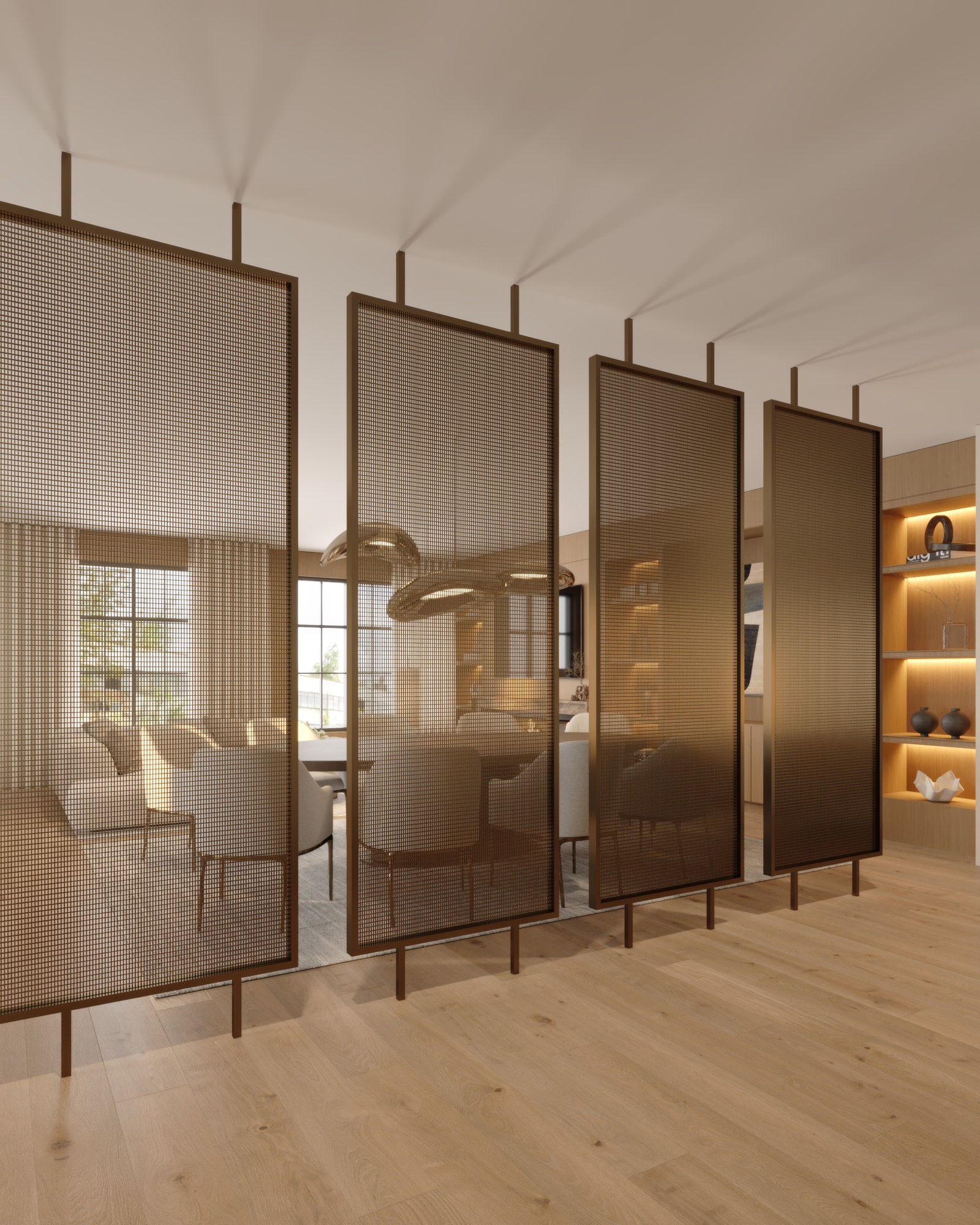 Bronze mesh screen partitions dividing the living and dining areas